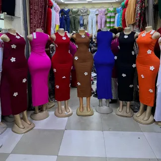 Bodycon dresses in several colours on mannequins
