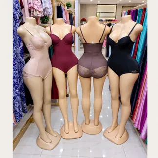 Spandex bodysuits in nude, burgundy, brown and black on mannequins